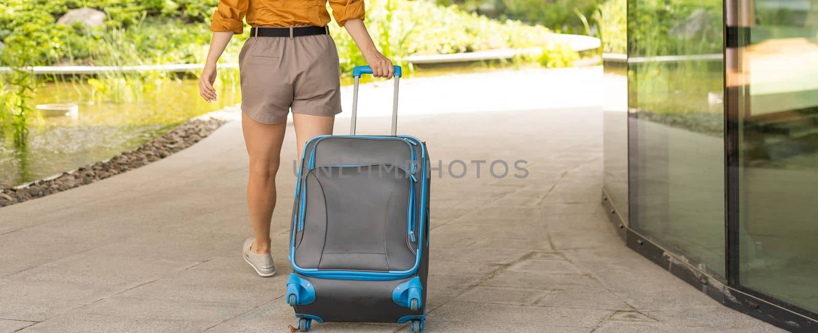 Woman travel. woman with suitcase.