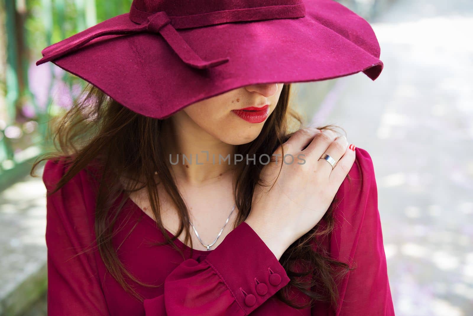girl in the hat, red dress, hands close-up