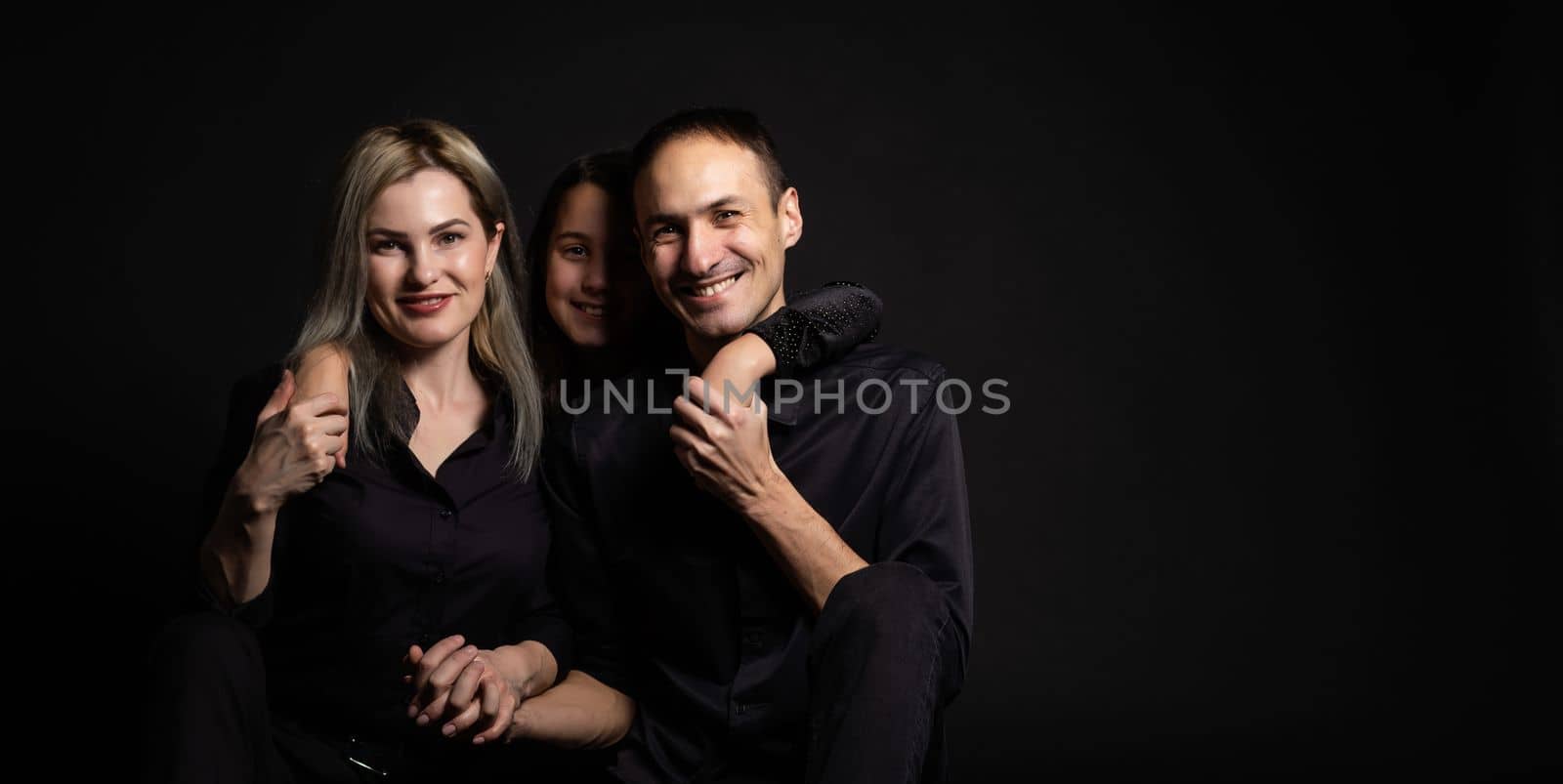 Family portrait on black background by Andelov13