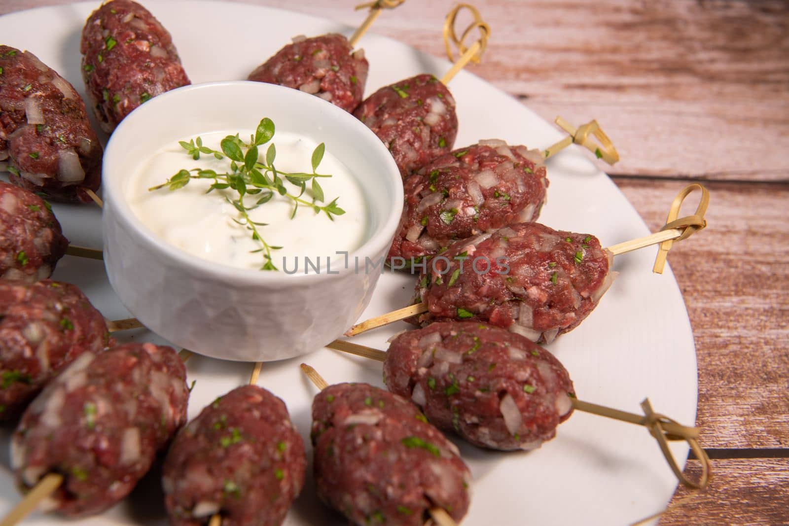 Recipe of kefta, beef skewer, Traditional homemade, with Greek yoghurt sauce, garlic, savory, Arabic and Libanese food, High quality photo