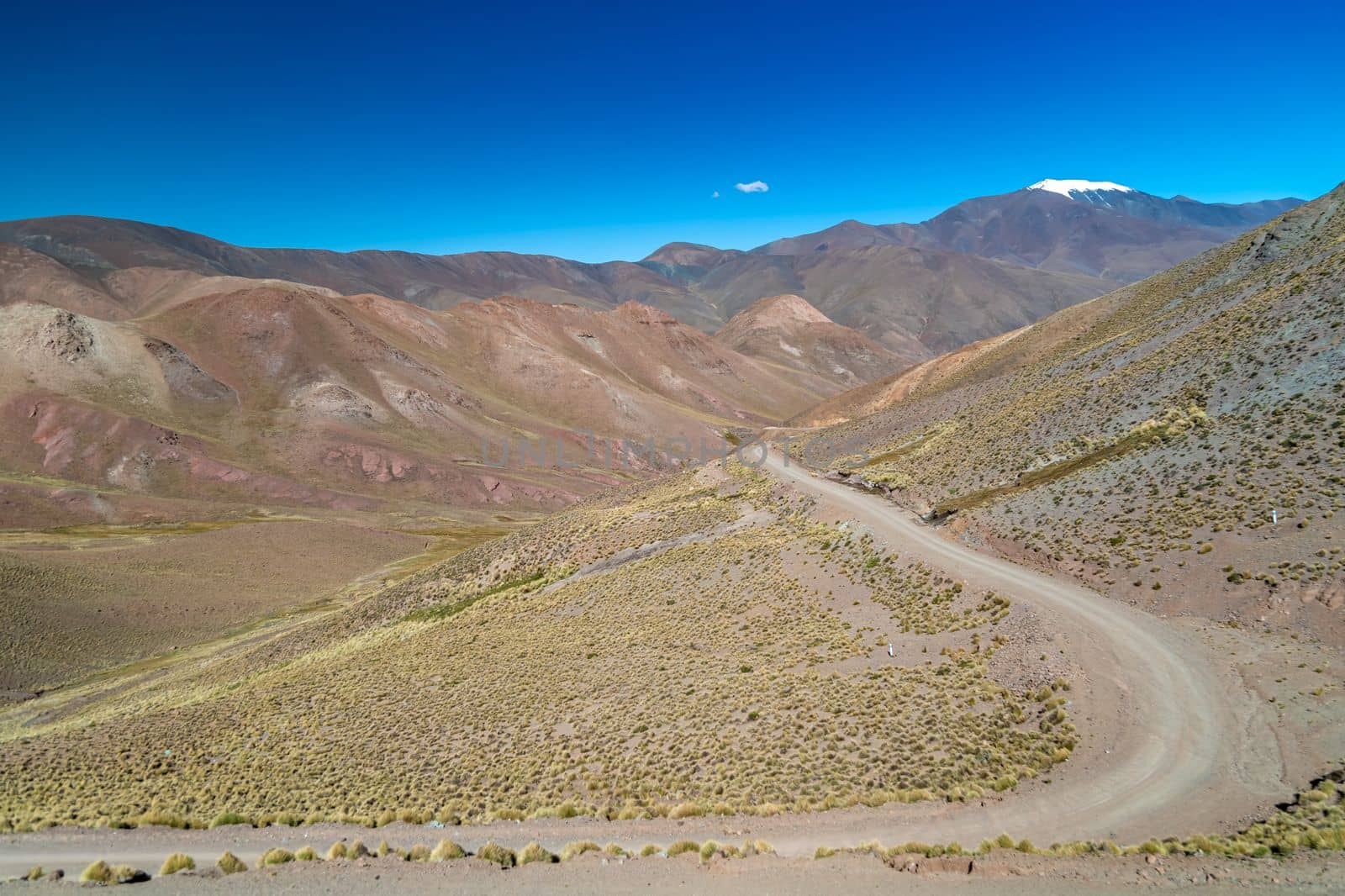 magnificent panorama of the South American Andes with snow-covered hills.