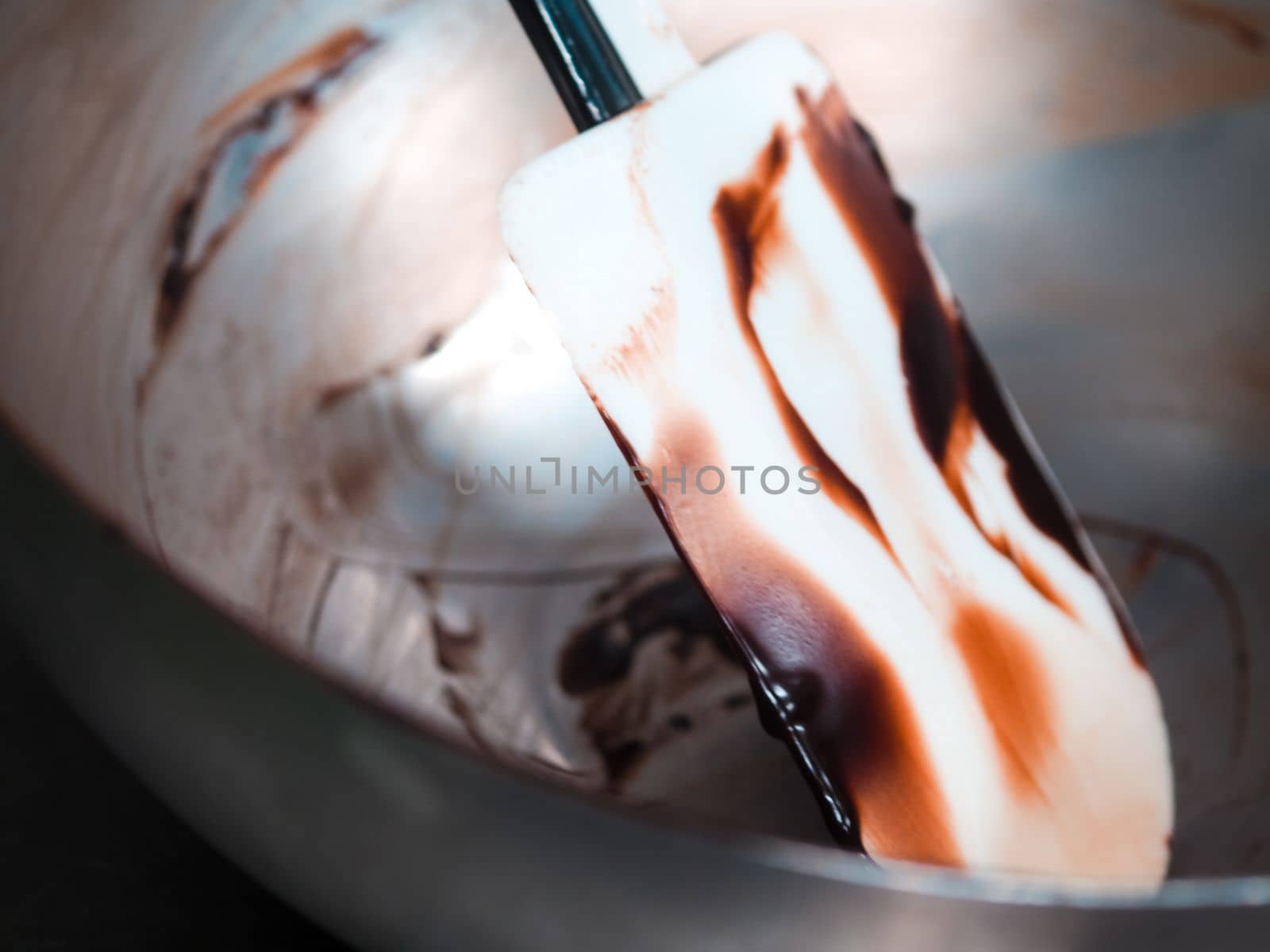 chocolate dirt spatula and bown close up by verbano