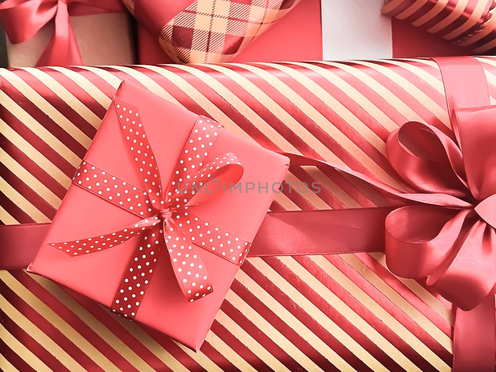 Holiday gifts and wrapped luxury presents, coral gift boxes as surprise present for birthday, Christmas, New Year, Valentines Day, boxing day, wedding and holidays shopping or beauty box delivery concept