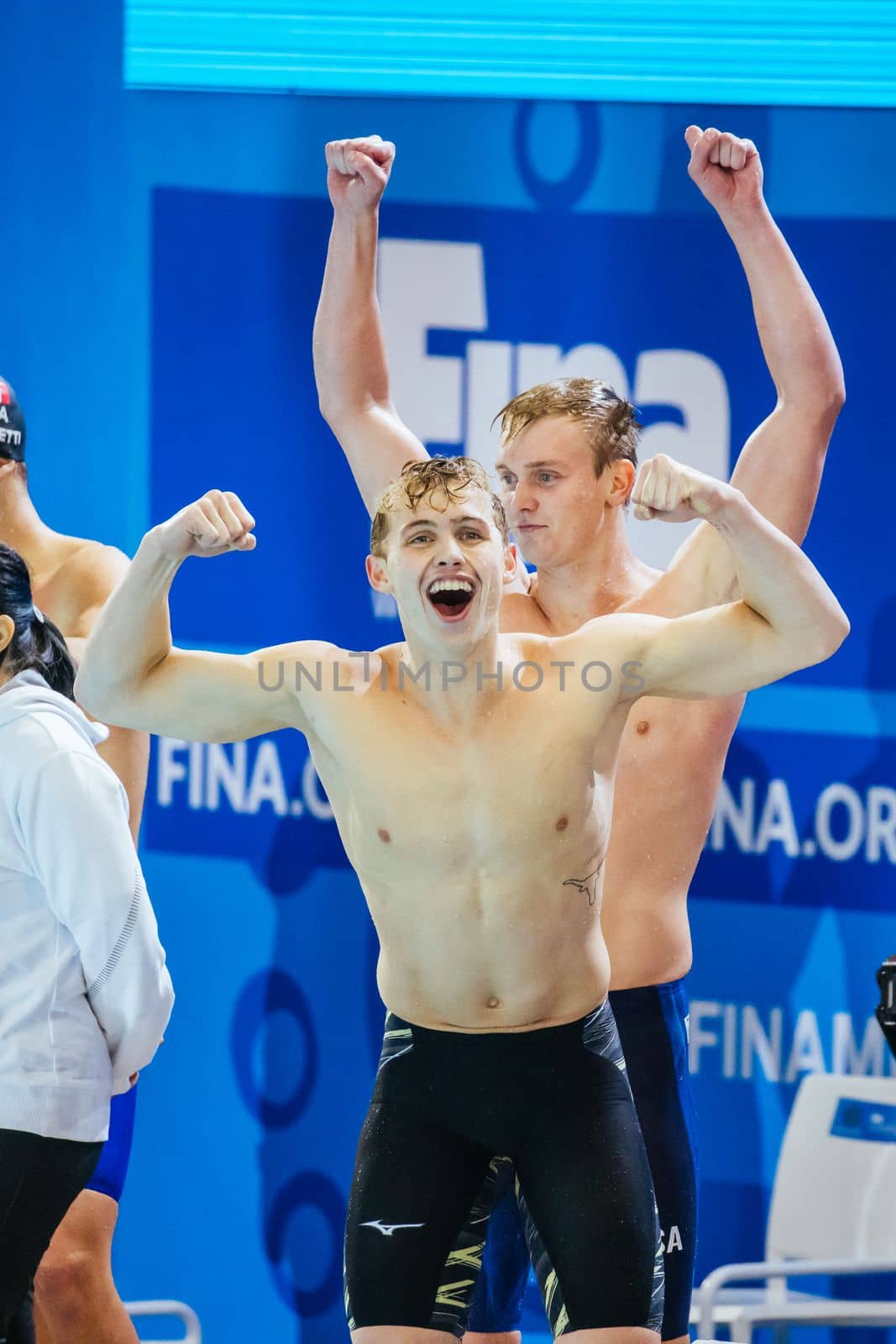 MELBOURNE, AUSTRALIA - DECEMBER 16: Team USA and Carson FOSTER celebrates winning the Men's 4x200m Freestyle final on day four of the 2022 FINA World Short Course Swimming Championships at Melbourne Sports and Aquatic Centre on December 16, 2022 in Melbourne, Australia
