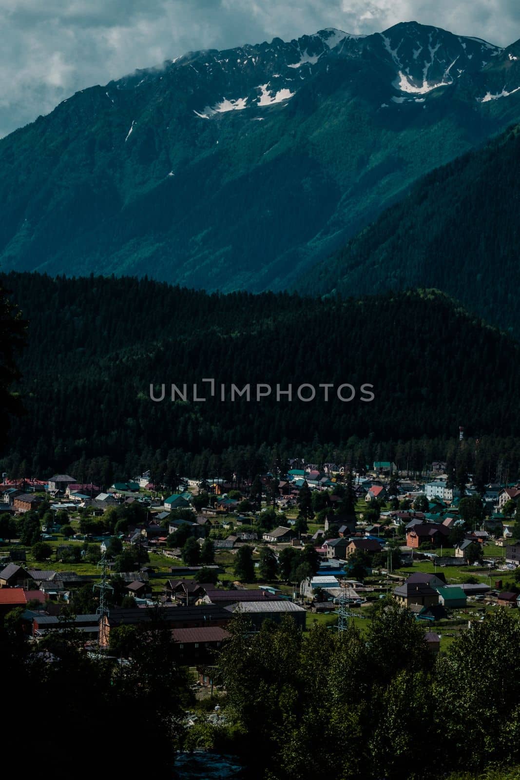 Magnificent view of village in mountains by Dustick