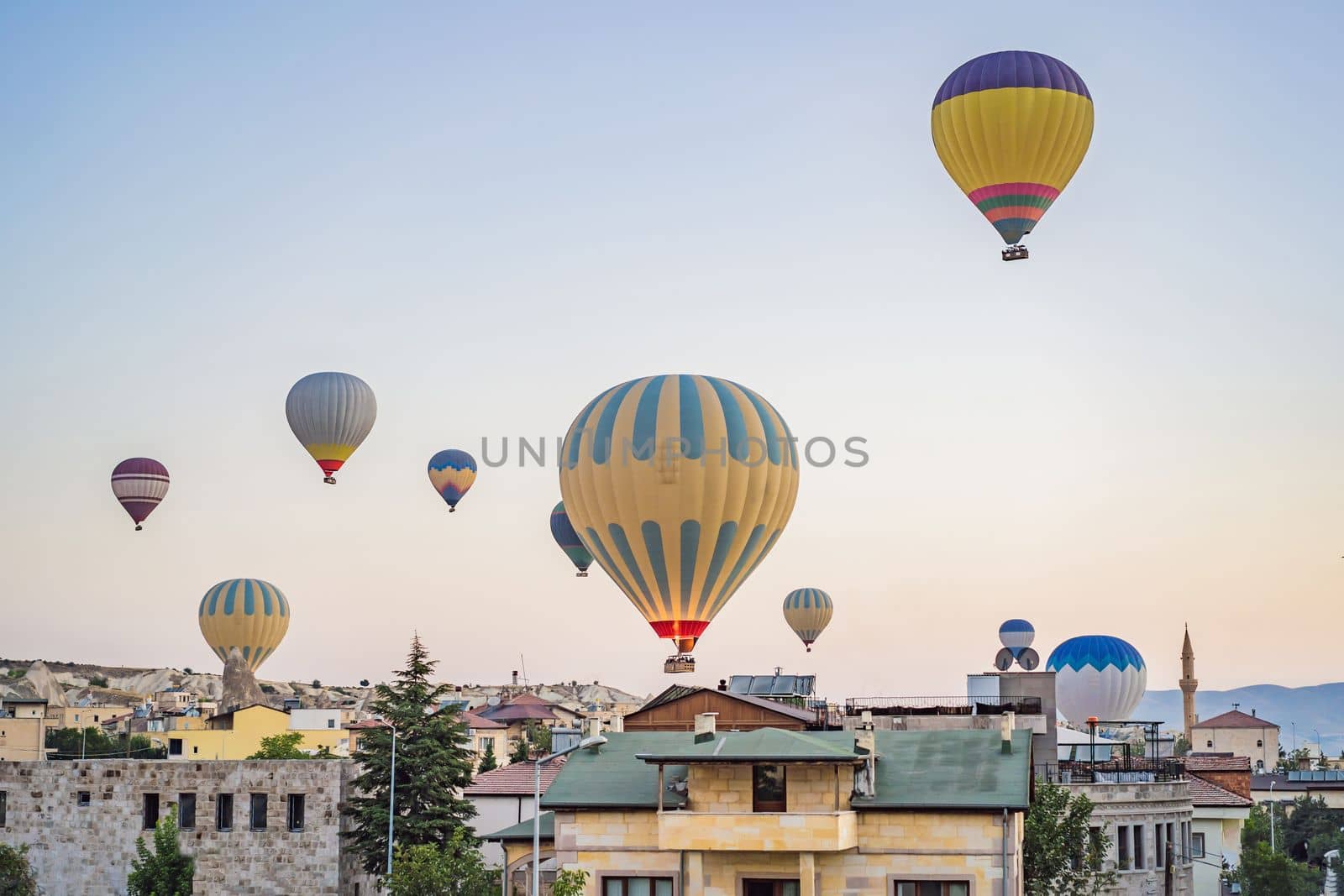 Colorful hot air balloon flying over Cappadocia, Turkey.