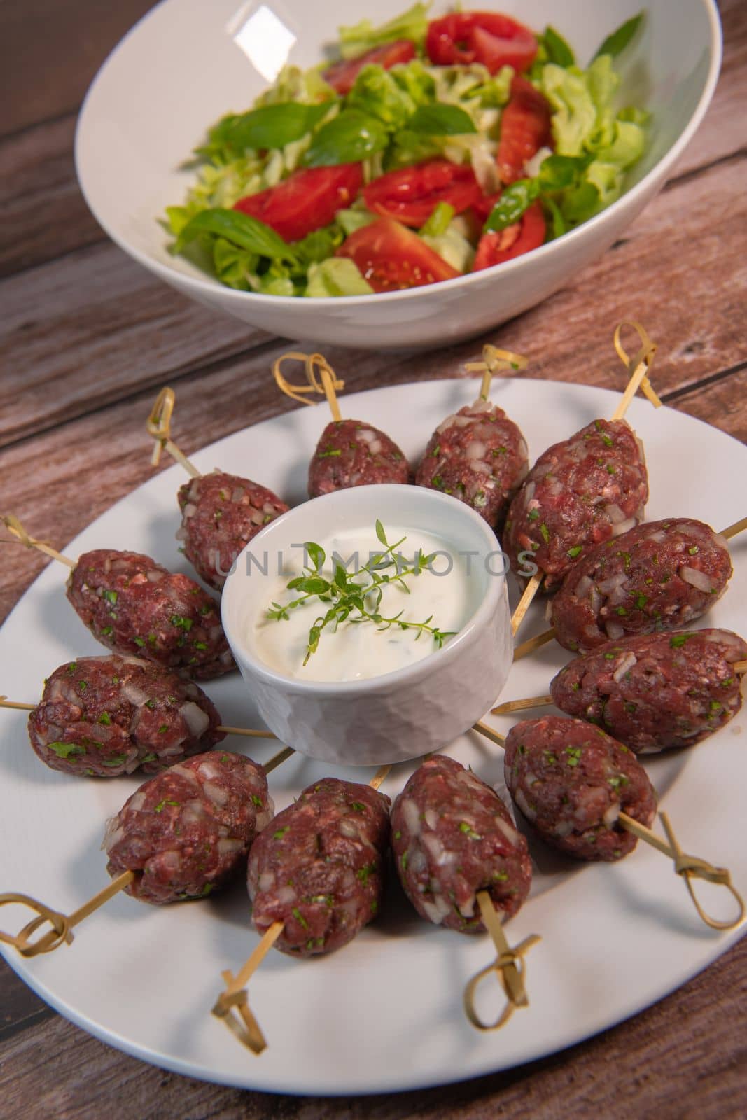 Recipe of kefta, beef skewer, Traditional homemade, with Greek yoghurt sauce, garlic, savory, Arabic and Libanese food, High quality photo