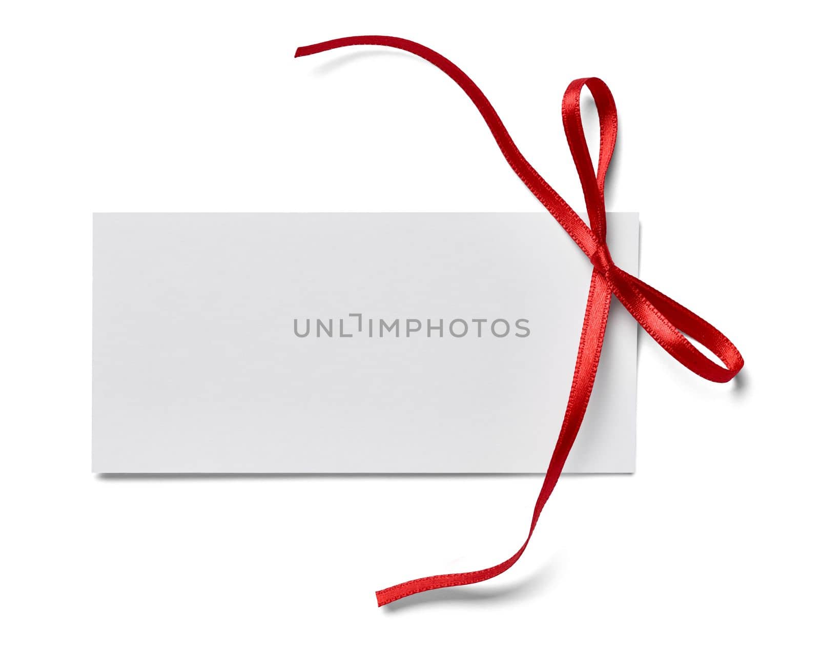 close up of a note card with ribbon bow on white background