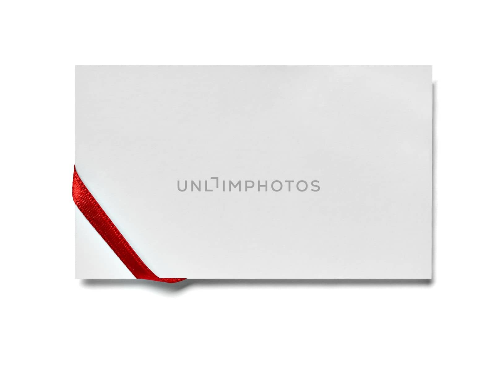 close up of a note card with ribbon bow on white background