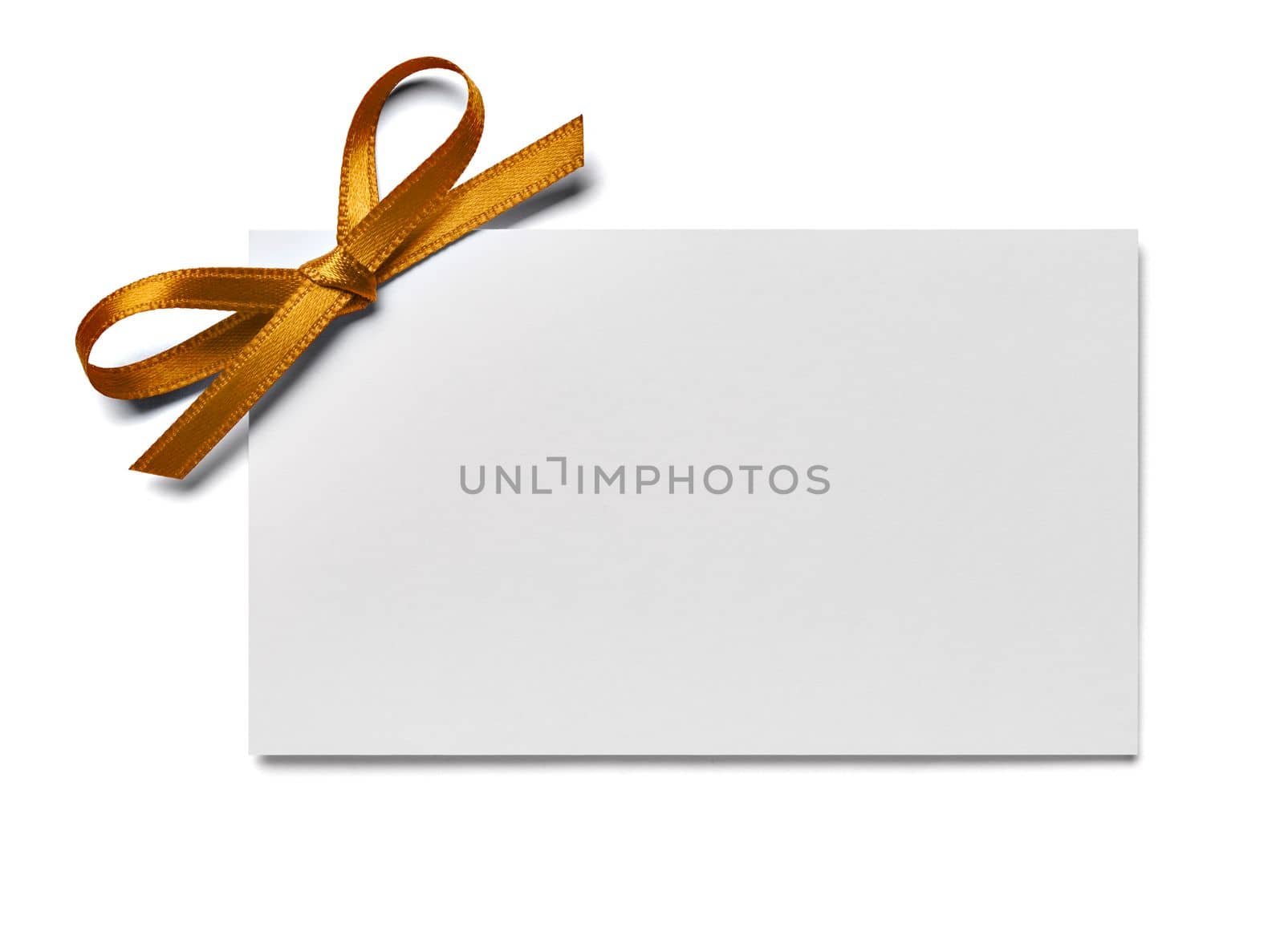 close up of a note card with ribbon bow on white background