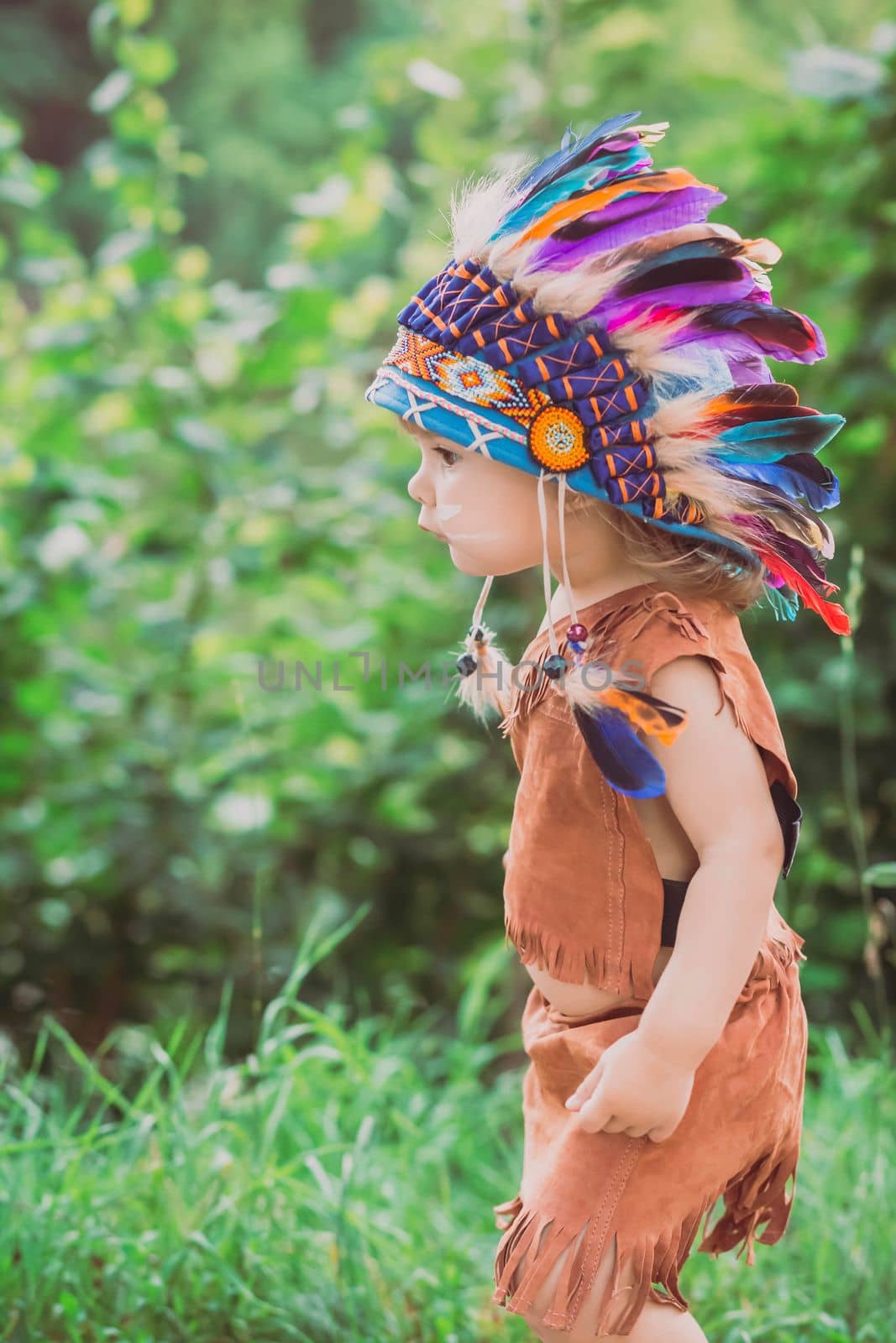 charming baby dressed in traditional American clothing.