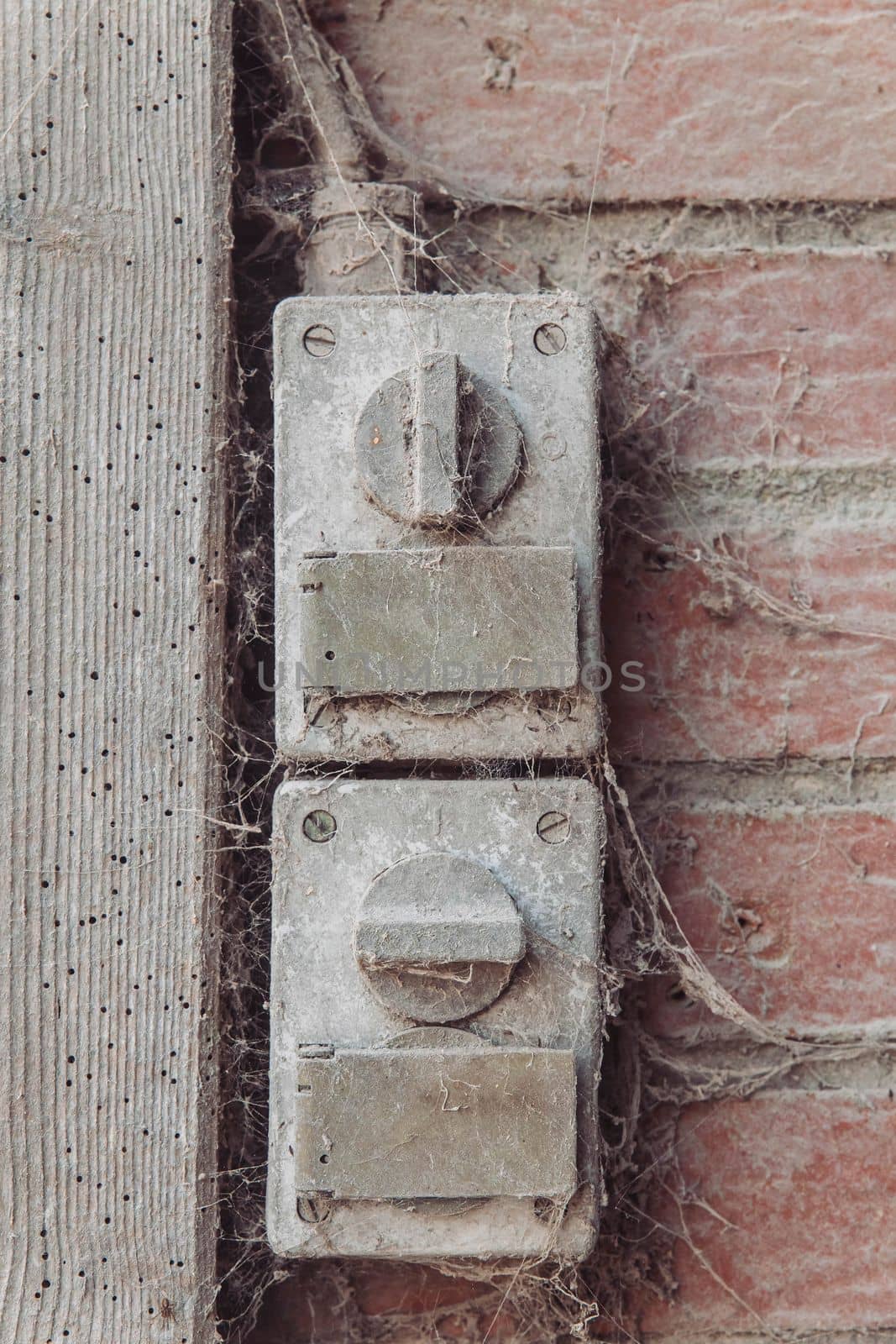 Old cobweb-covered switches in the factory. 