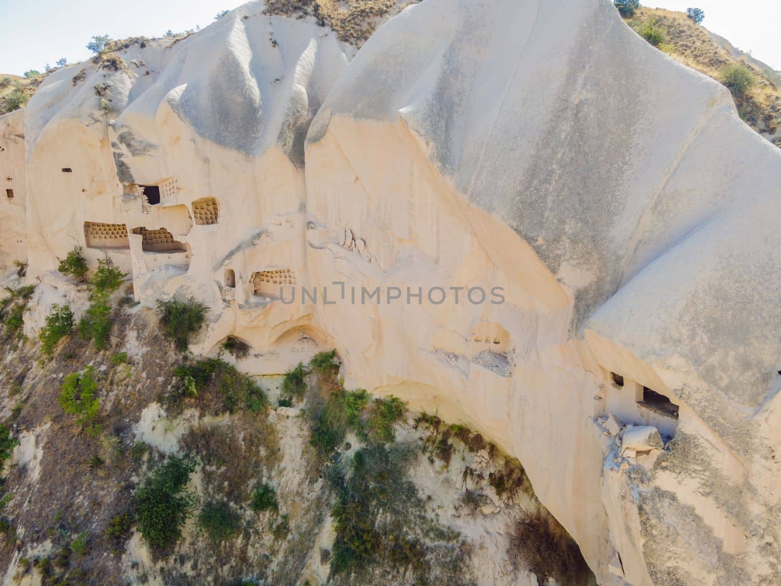 Beautiful stunning view of the mountains of Cappadocia and cave houses. Turkey by galitskaya