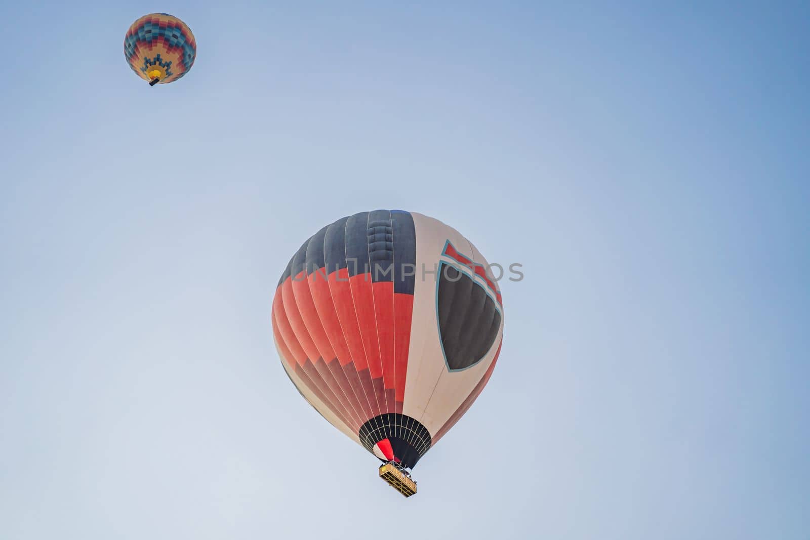 Beautiful hot air balloons over blue sky.