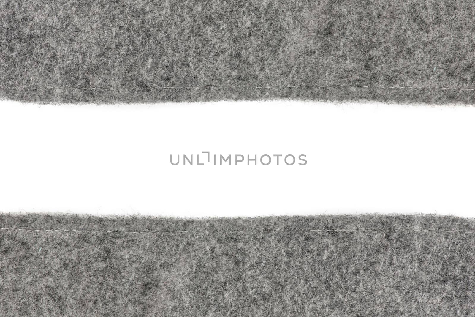 Felt texture. Texture of gray felt isolated on white background. Abstract background with natural gray felt. High resolution texture photo.