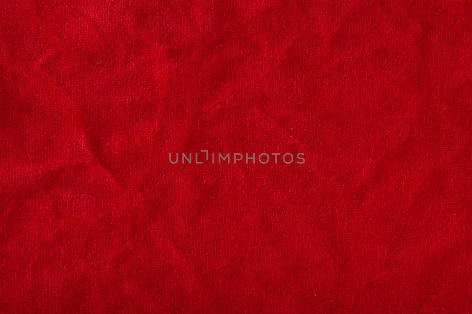 Red velvet texture for postcard or background for design. Red background for Christmas theme or Valentine's day, high quality, large format