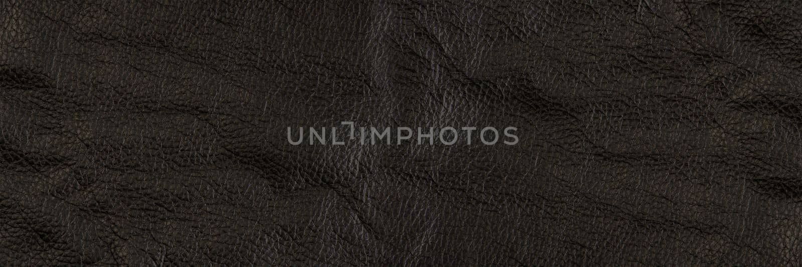 black leather texture, close-up of black genuine leather. Leather top view in folds and bumps. by SERSOL
