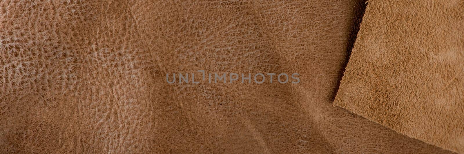 Texture of brown leather. Texture of natural brown leather. Background for design or project.