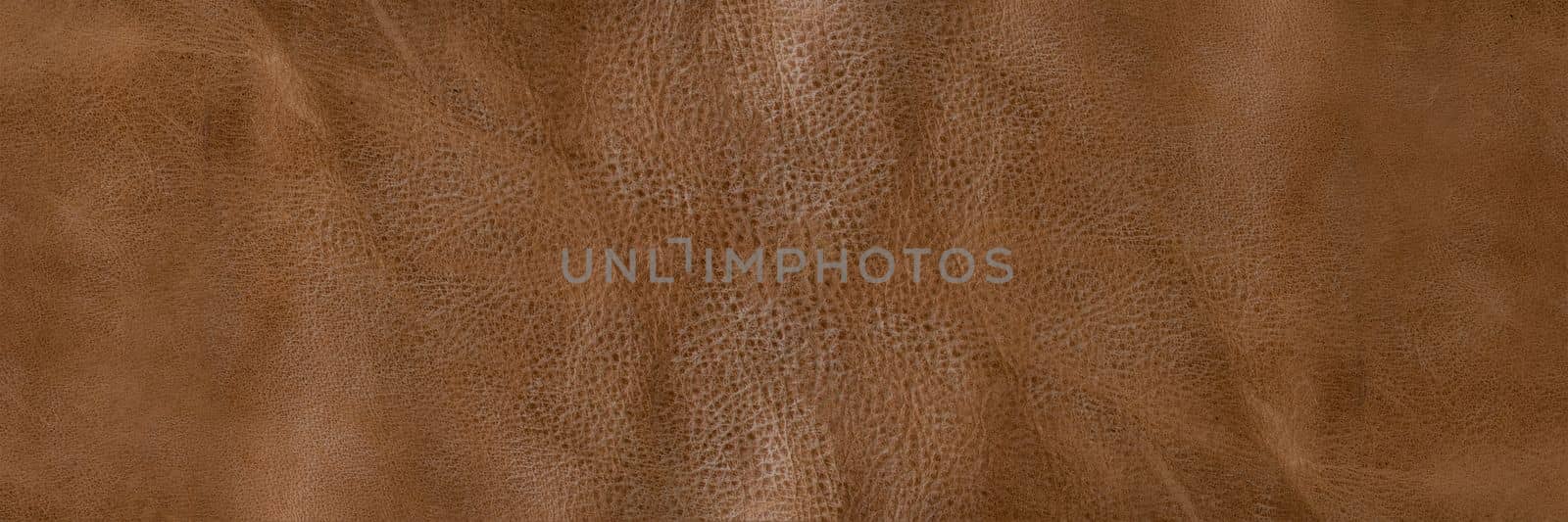 Texture of brown leather. Texture of natural brown leather. Background for design or project.