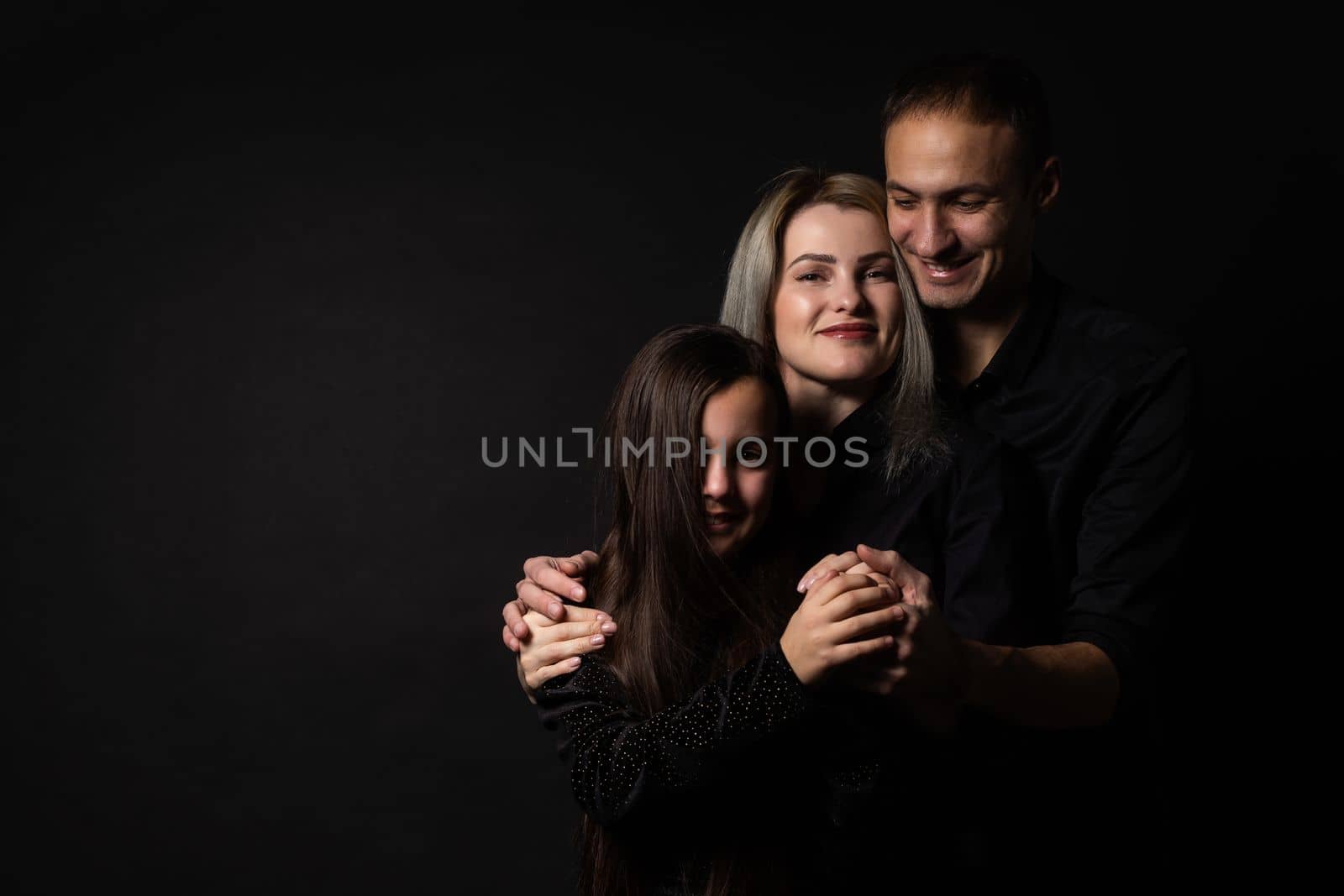 family on a black background by Andelov13