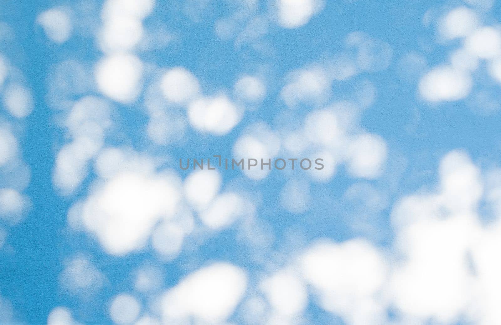 luxury white and blue bokeh texture on white wall background light and shadows by KaterinaDalemans