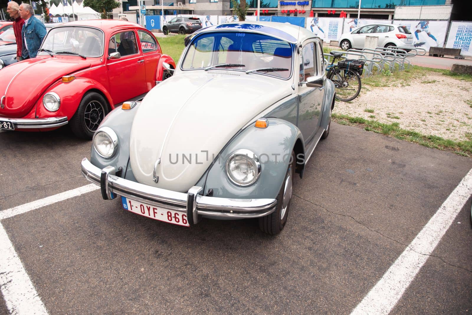 Genk, BELGIUM, August 18, 2021: classic summer meet of oldtimer at The Luminus Arena Genk,grey volkswagen beetle, High quality photo