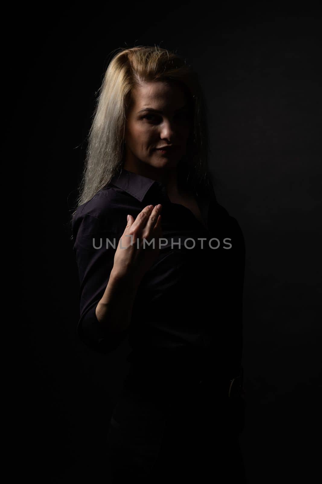 beauty woman on dark background.