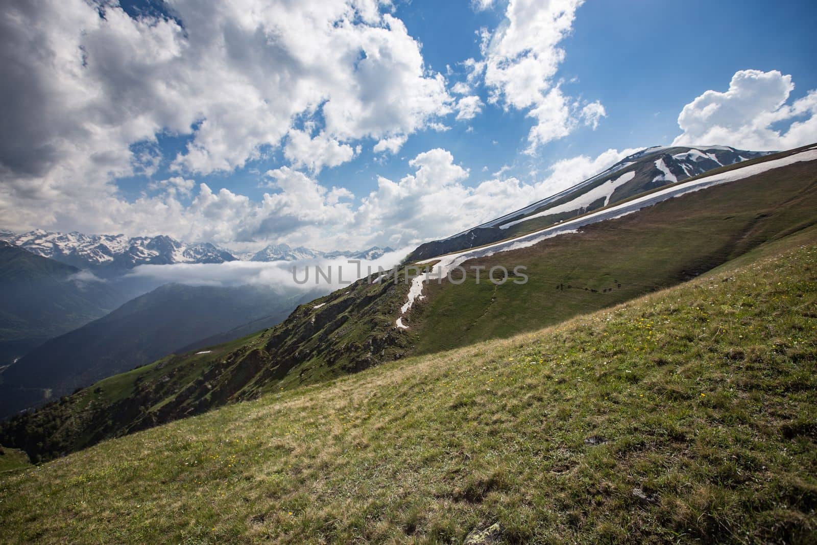 Fabulous magnificent view of Caucasus Mountains and sky. High quality photo