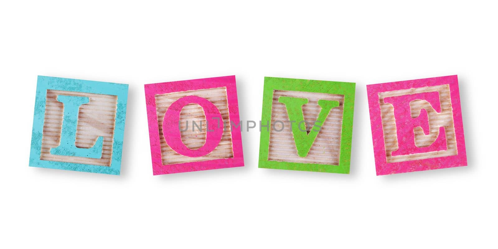 A love concept with childs wood blocks on white with clipping path to remove shadow