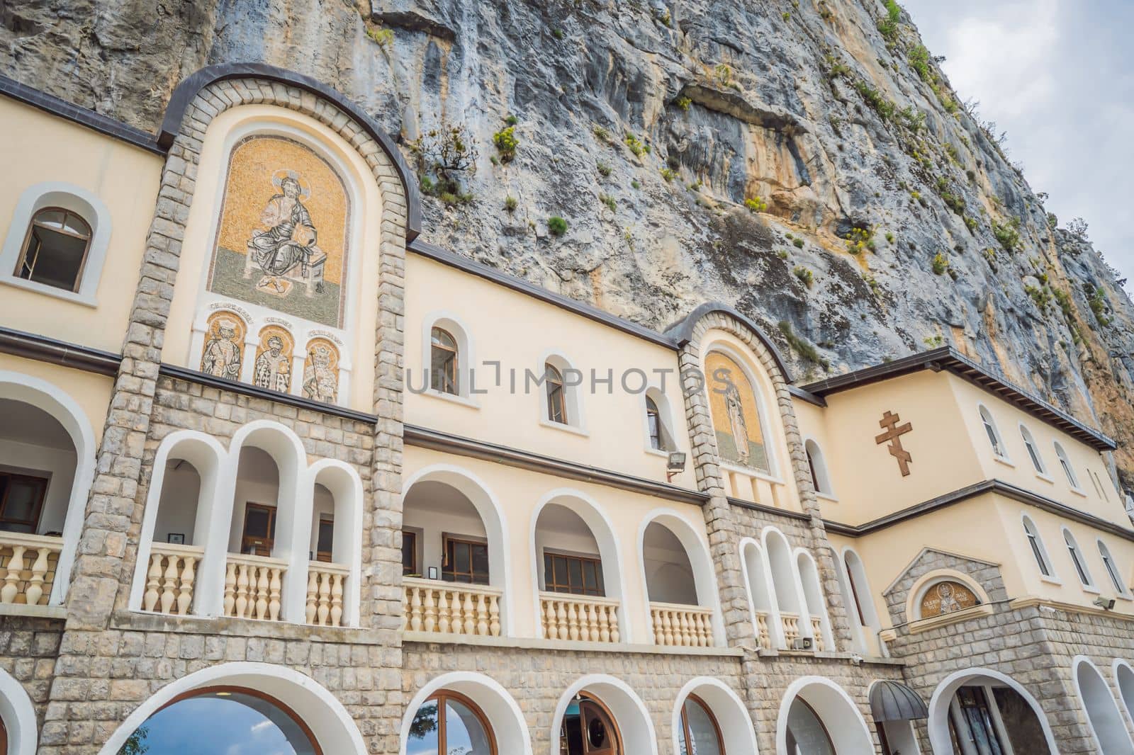 Monastery of Ostrog, Serbian Orthodox Church situated against a vertical background, high up in the large rock of Ostroska Greda, Montenegro. Dedicated to Saint Basil of Ostrog.