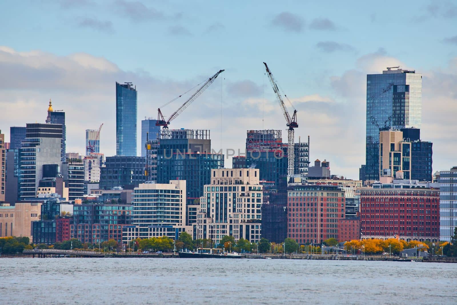 Image of Buildings under construction in skyline of New Jersey by river