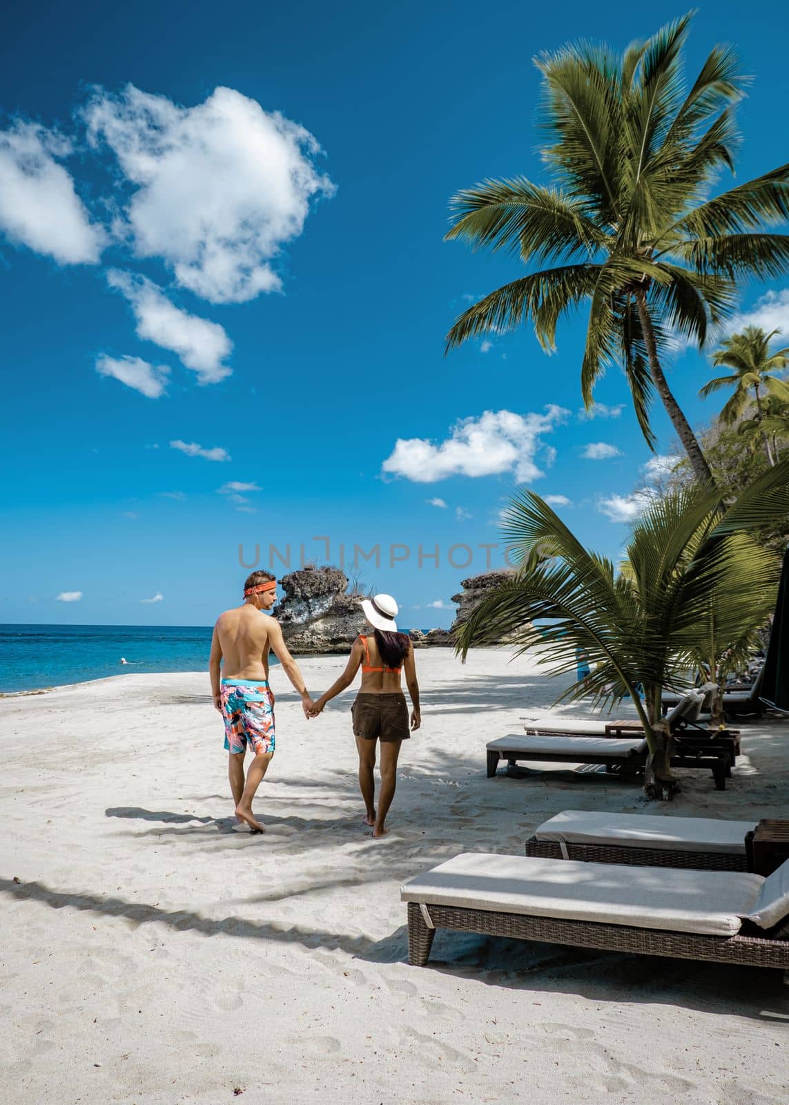 Saint Lucia Caribbean Island, couple men and woman on vacation at the tropical Island of St Lucia by fokkebok