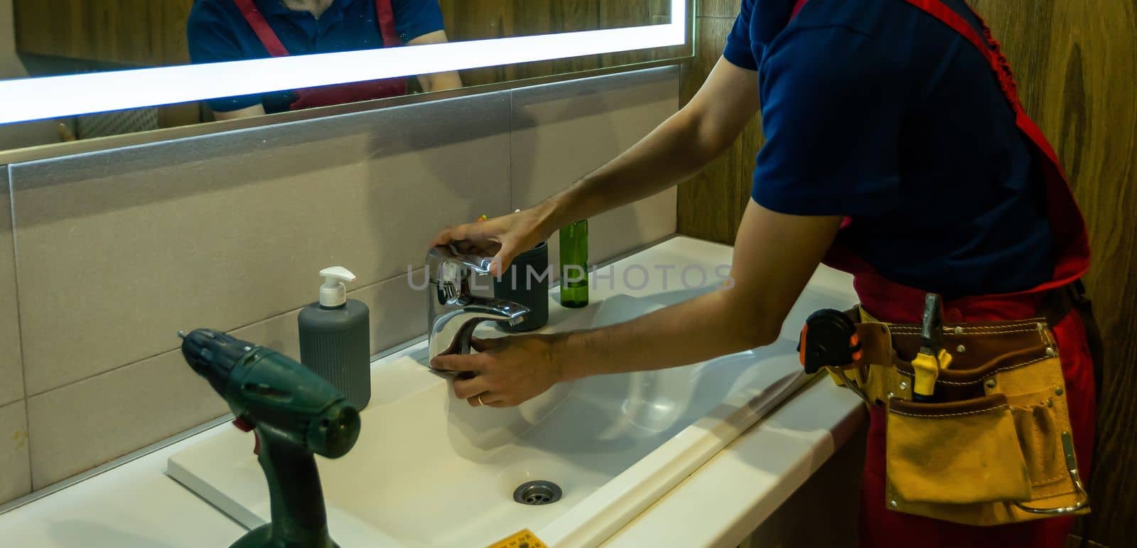 Plumber Mending Tap With Adjustable Wrench.