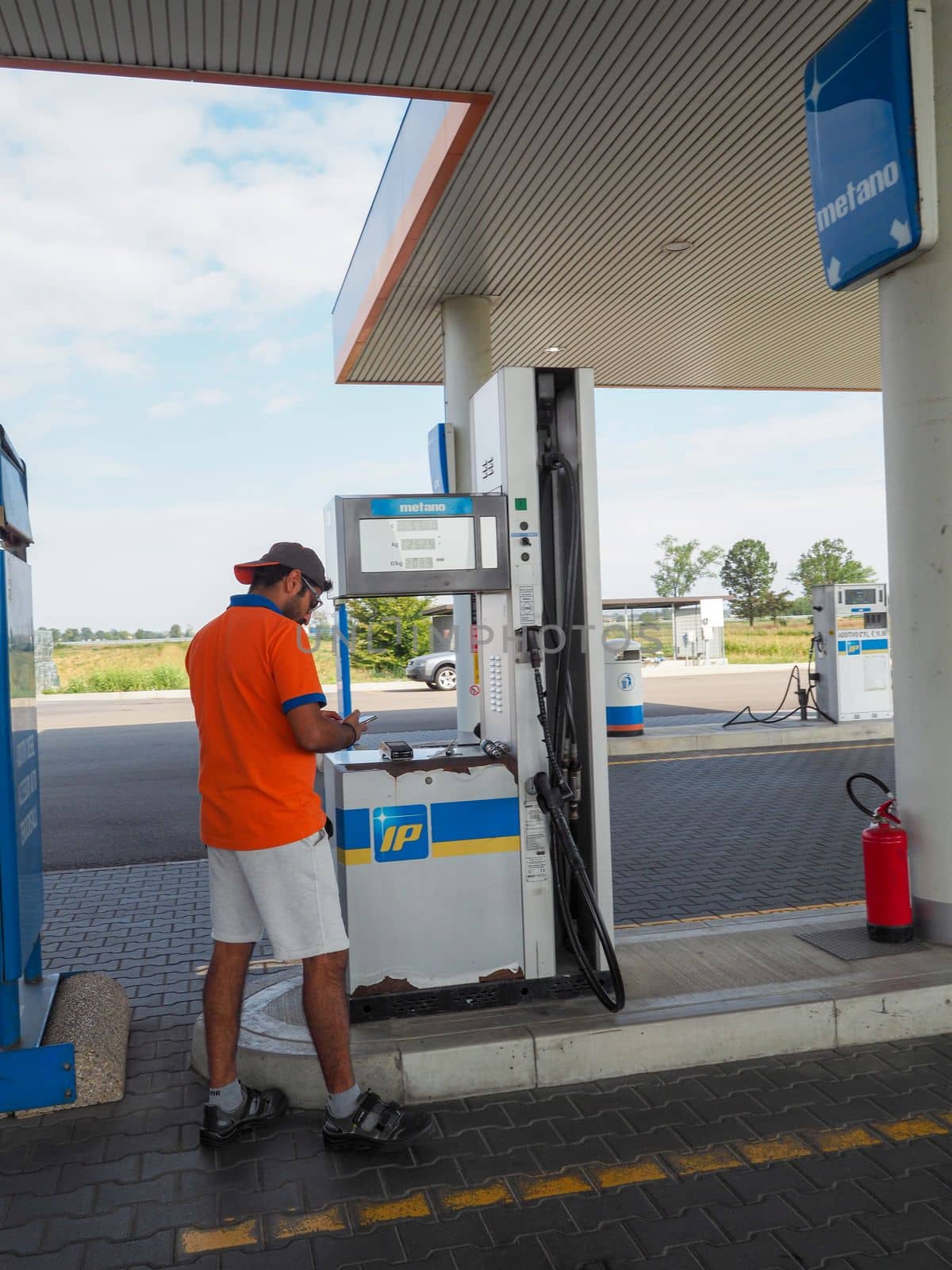 Caorso, Italy - September 2022 Cars being charged at LPG gas stations by verbano