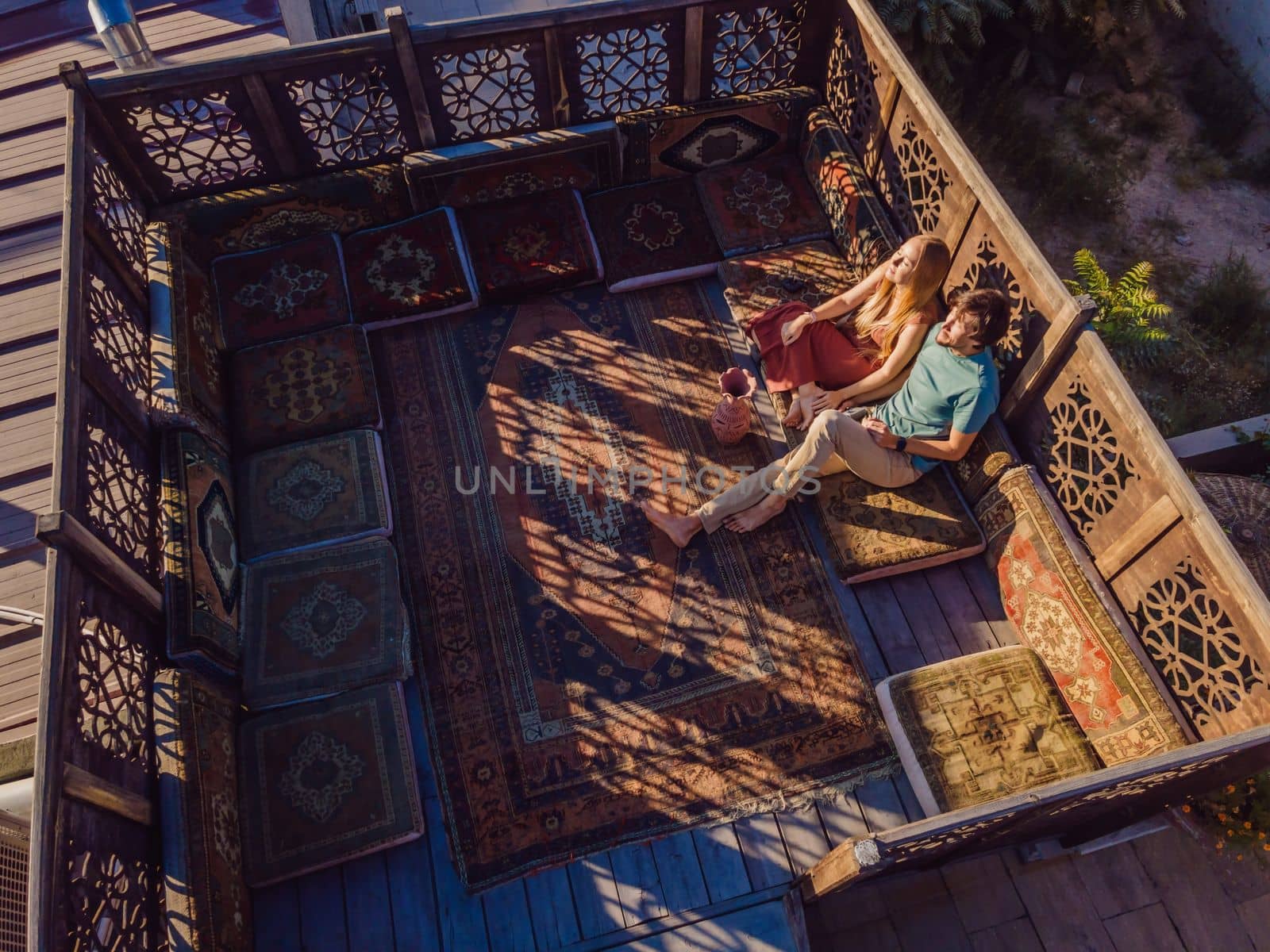 Beautiful morning in Cappadocia - a young couple on the Turkish terrace.
