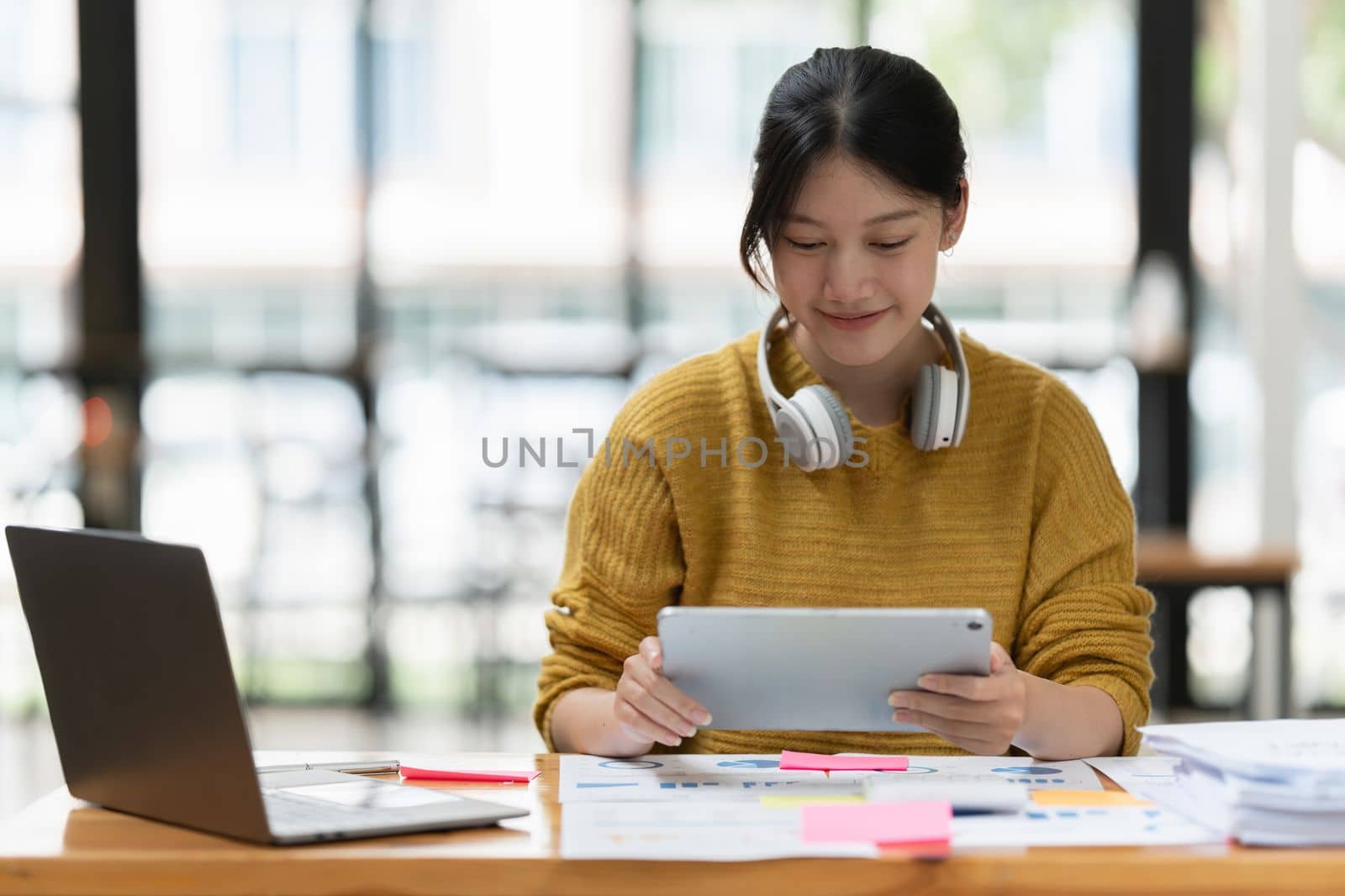 Smart asian business woman smiling at office space. real estate, lawyer, non-profit, marketing, account.