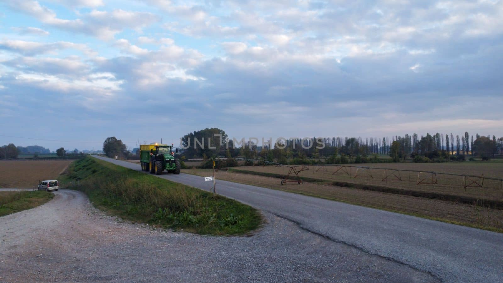 Stagno Lombardo, Italy - November 2022 drone view of rural area near river Po at dusk