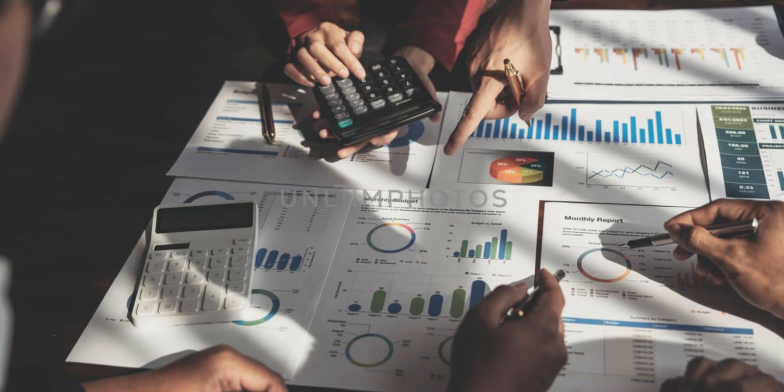 Business financial, accountant discussing with partner are meeting to audit finance planning sales to meet targets set in next year. stock market concept....