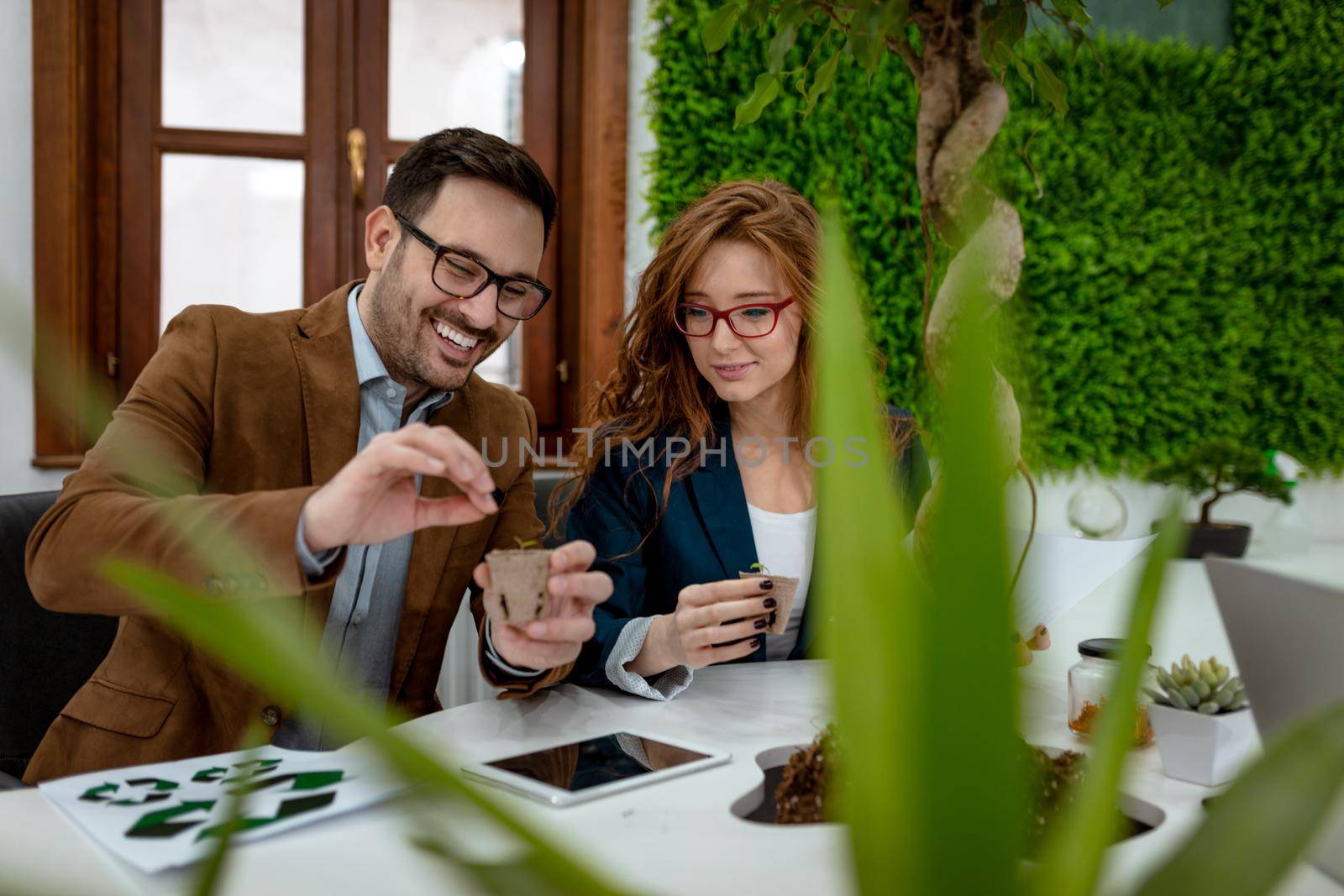 Scientist Examining Samples With Plants by MilanMarkovic78