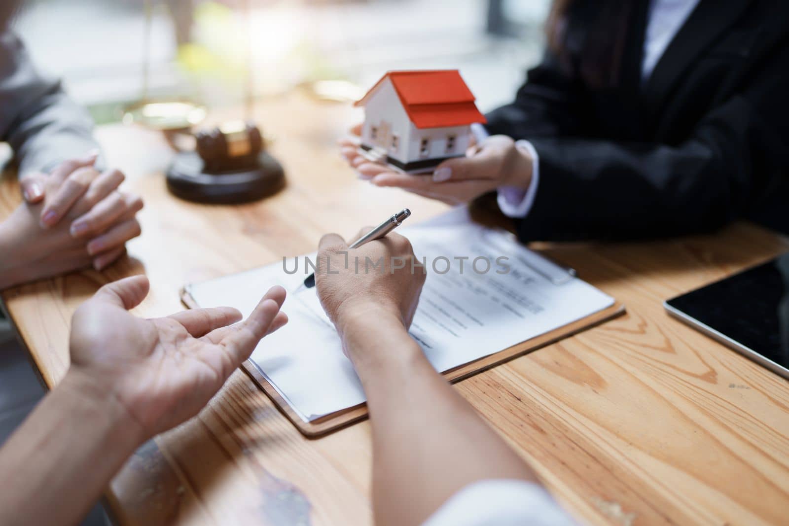 Guarantee, mortgage, agreement, contract, sign, real estate agent delivers the house to the customer after signing important contract documents.
