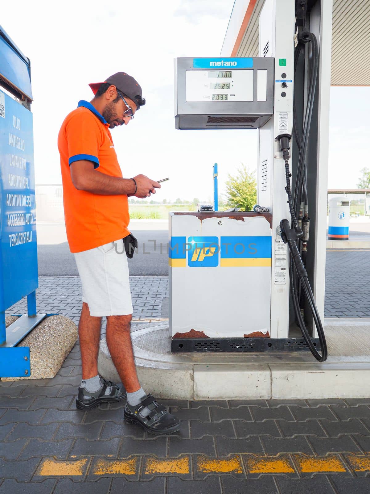 Caorso, Italy - September 2022 Cars being charged at LPG gas stations by verbano