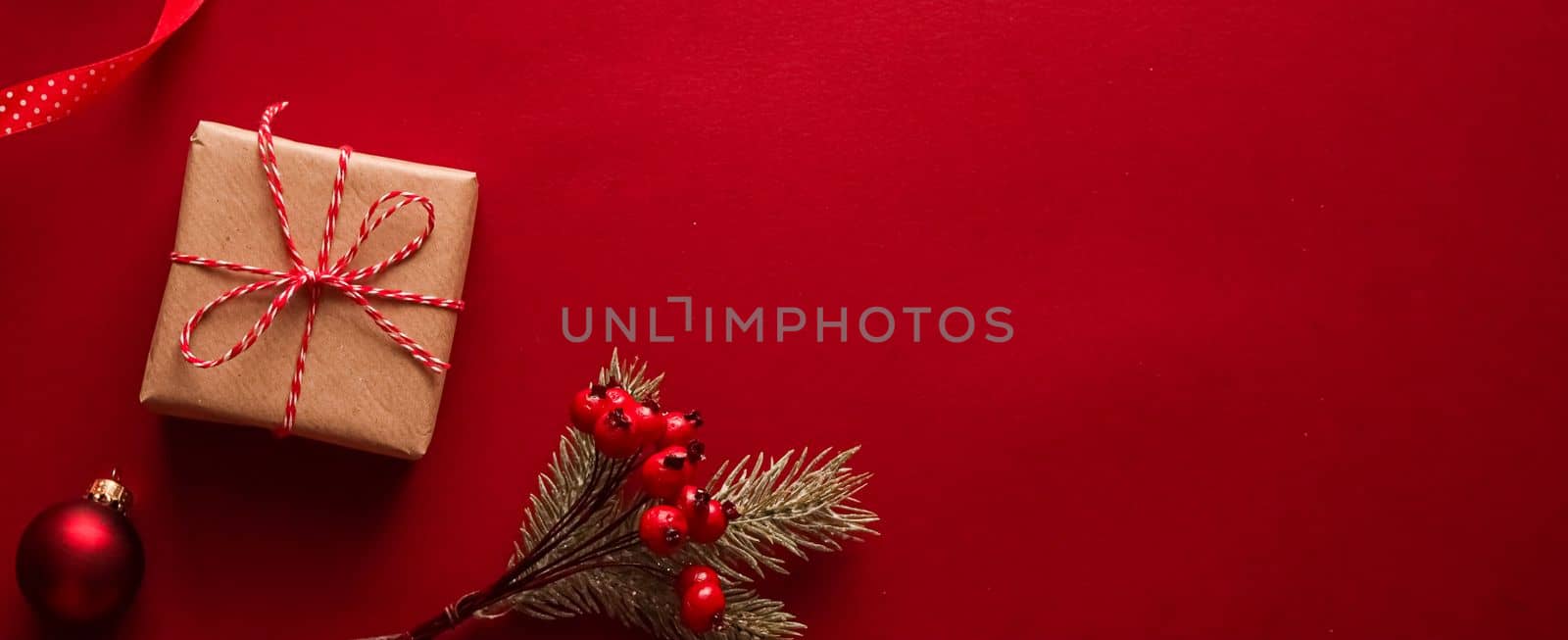 Christmas gifts, boxing day and traditional holiday presents flat lay, classic xmas gift boxes on red background, wrapped present with festive ornaments and decorations for holidays flatlay design