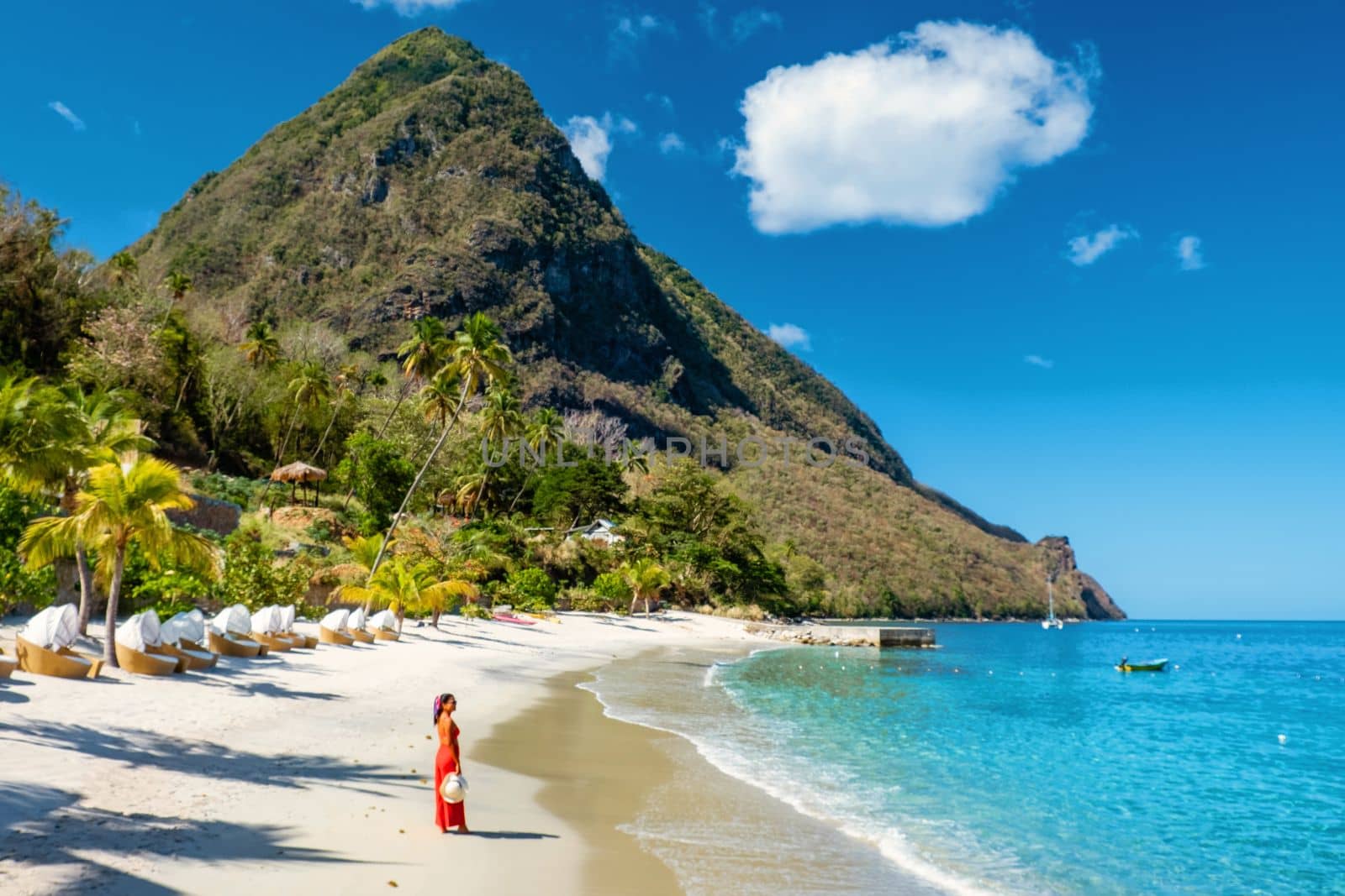 St Lucia Caribbean, woman on vacation at the tropical Island of Saint Lucia Caribbean ocean, Asian women in red dress on the ebach