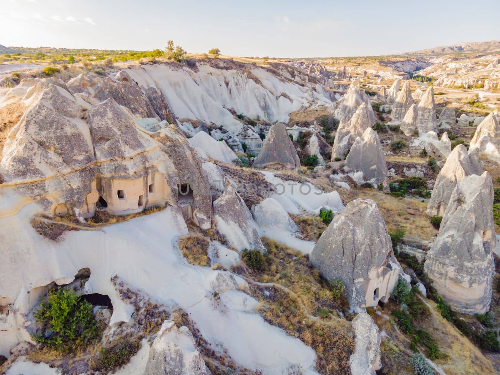 Beautiful stunning view of the mountains of Cappadocia and cave houses. Turkey by galitskaya