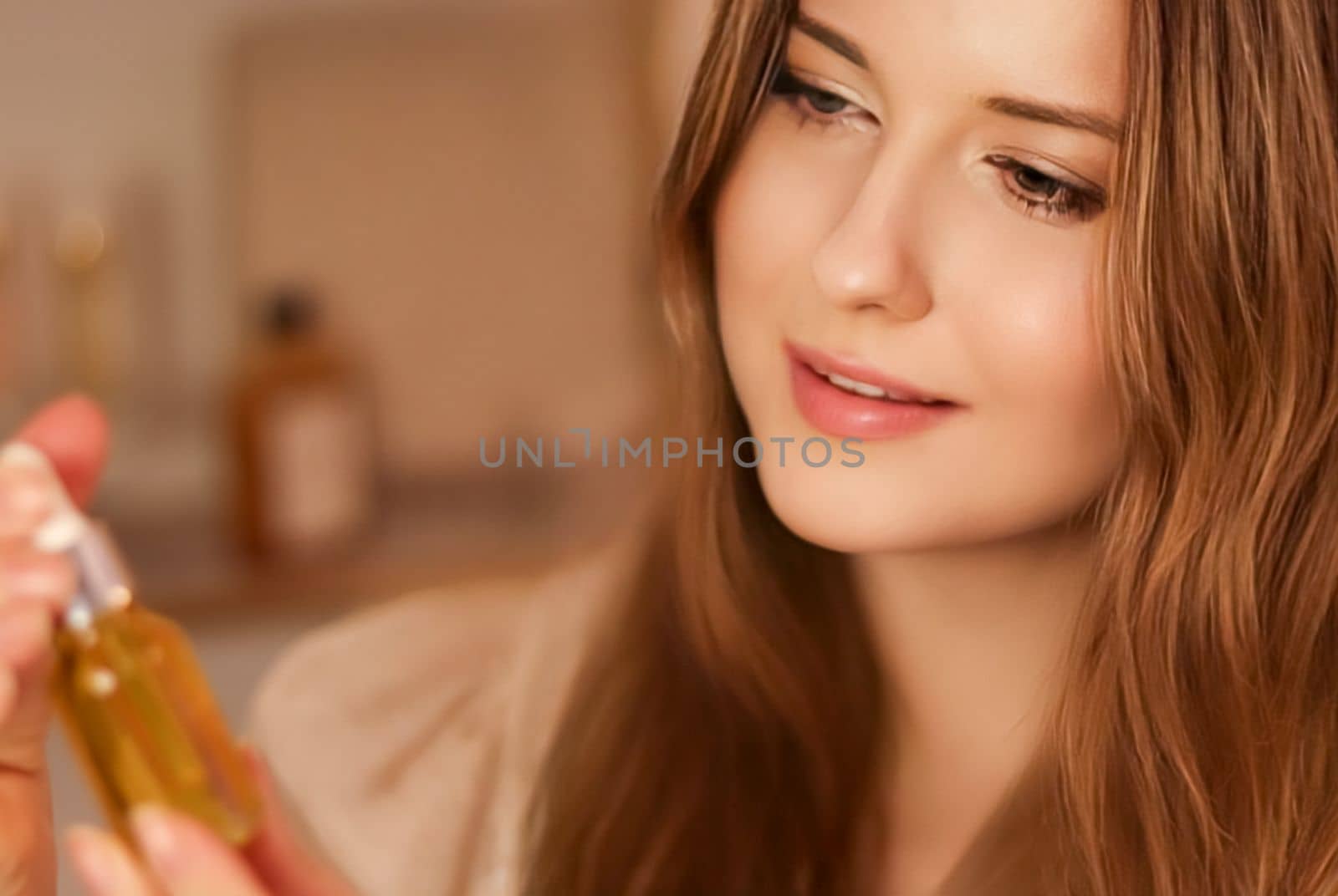 Beautiful woman with organic oil serum bottle, evening beauty and skincare routine by Anneleven