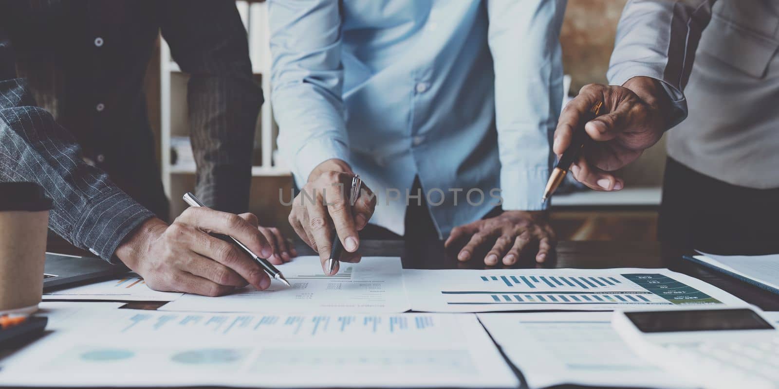 Business people accountant or financial expert analyze with document report. finance economy, banking, business, analyze concept by itchaznong