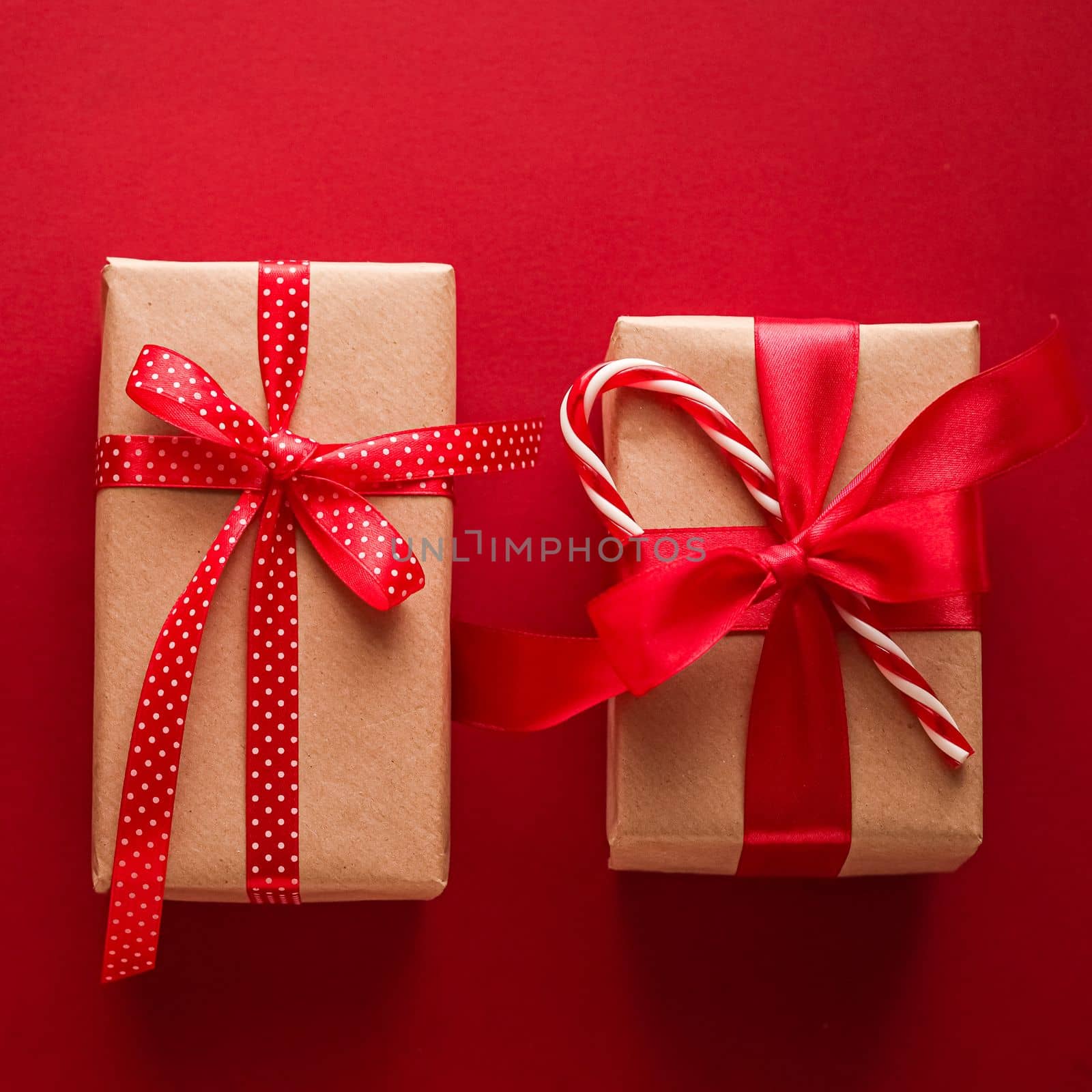 Christmas gifts, boxing day and traditional holiday presents flat lay, classic xmas gift boxes on red background, wrapped present with festive ornaments and decorations for holidays flatlay by Anneleven