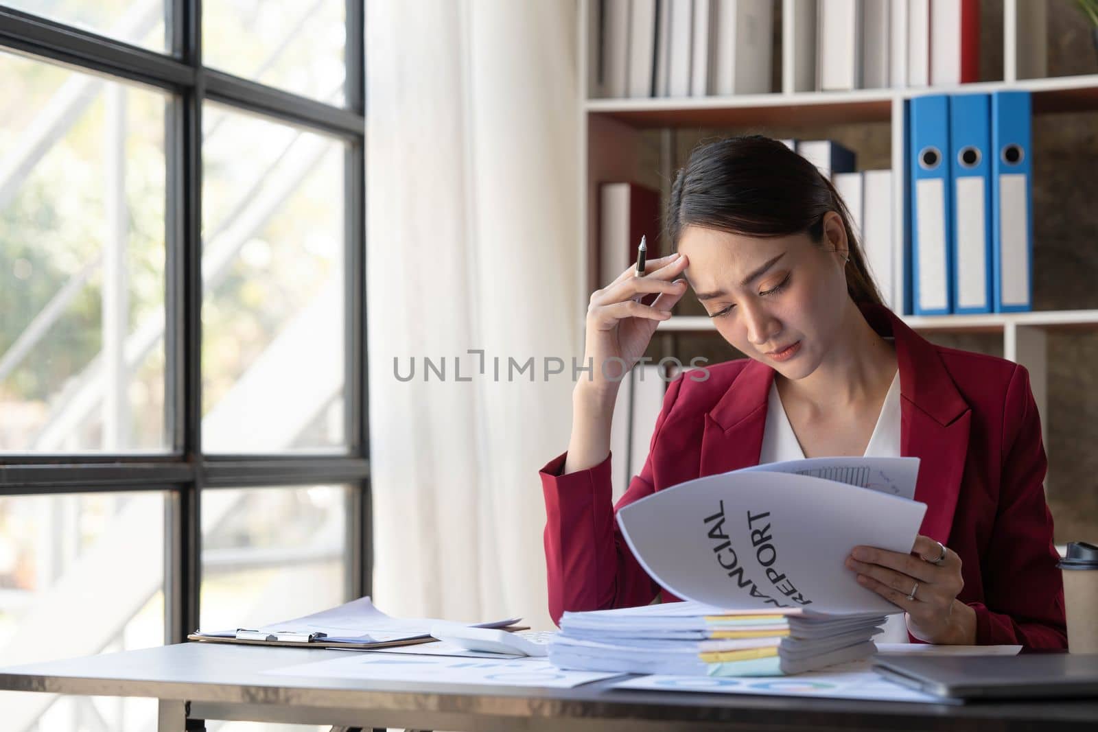 Young Business Asian women are stressed while working on laptop, Tired asian businesswoman with headache at office, feeling sick at work copy space in workplace an home office...