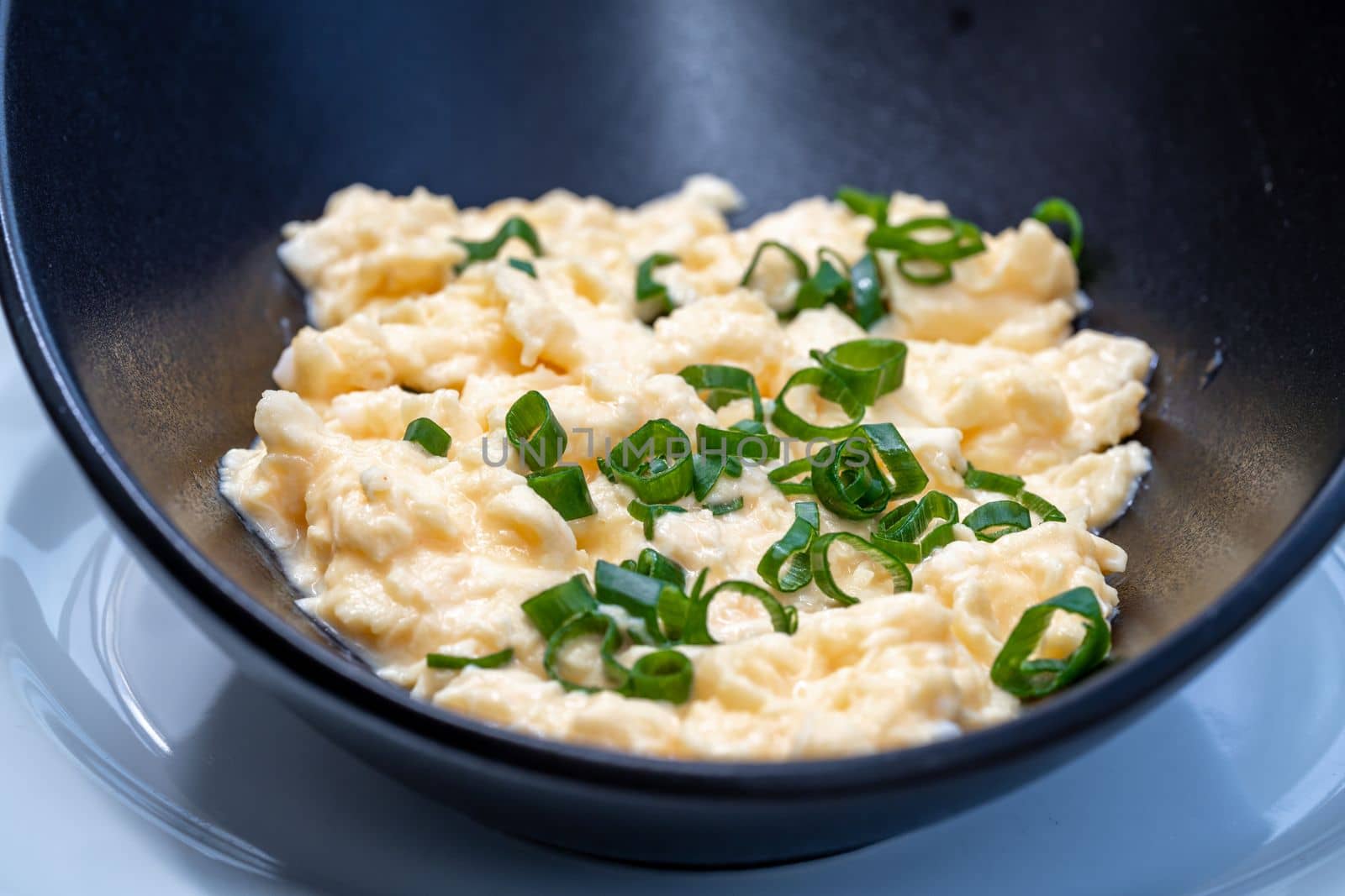 scrambled eggs with fresh green onions.