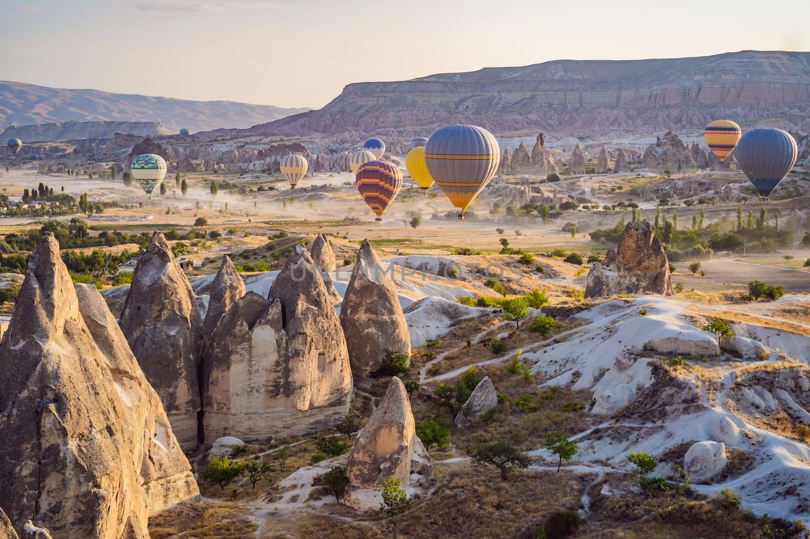 Colorful hot air balloon flying over Cappadocia, Turkey.